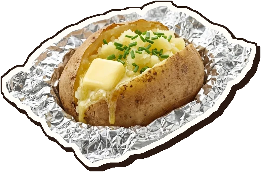 A baked potato in crinkled foil, split open, with melting butter and chives